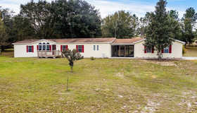 23320 S Dewey Robbins Road, Howey IN The Hills, FL 34737